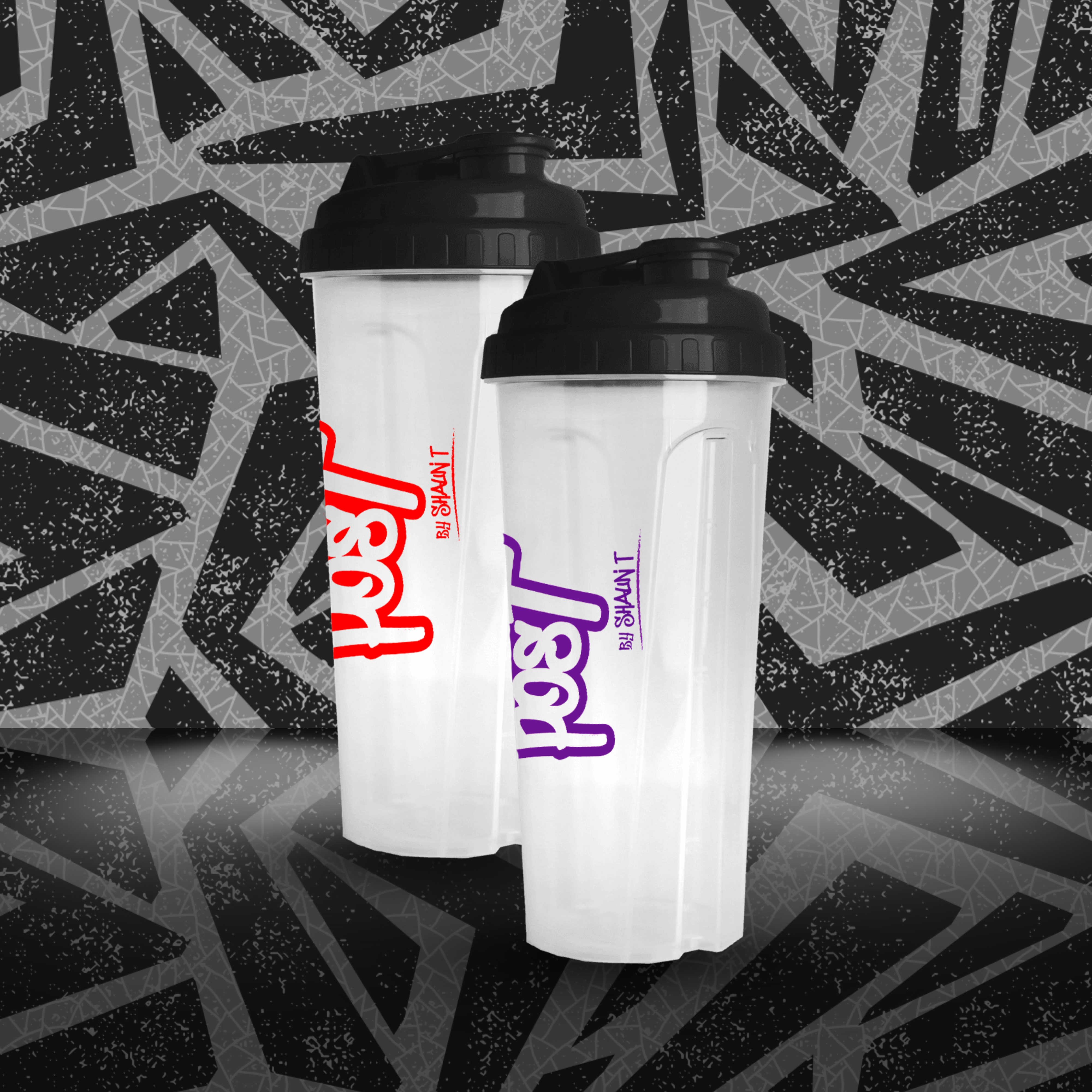 An image of two translucent white plastic shaker bottles with black screw-on lids set against a high-contrast, abstract geometric backdrop. The larger bottle sits behind and slightly to the left of the smaller one. Both bottles feature a tall, vertical stylized logo—bright red on the rear bottle and vibrant purple on the front—each accompanied by small matching text reading “by ShaunT.” They rest on a glossy surface that reflects the base of the bottles. The background consists of irregular black shapes out